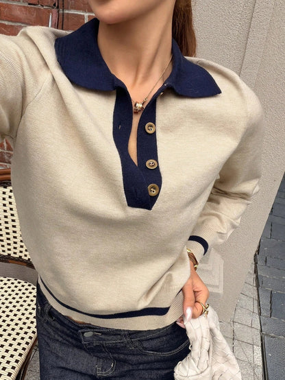 Women's autumn knit polo top in khaki and navy, layered under a blazer