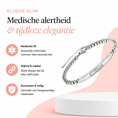 Close-up of deep-engraved Eliquis text and medical symbol on slim stainless steel bracelet