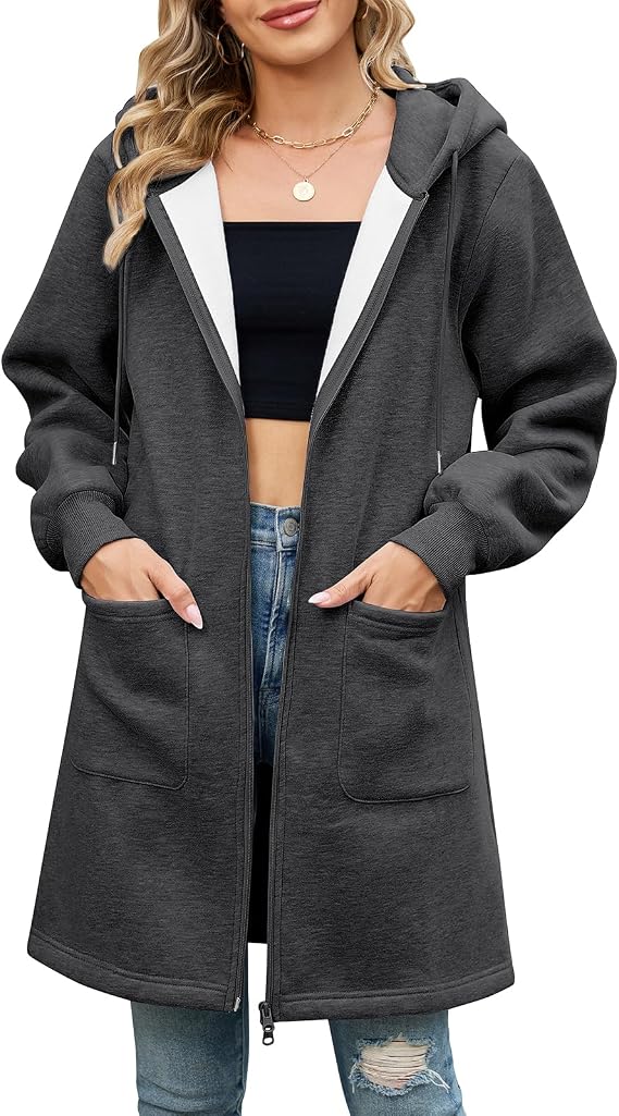 Women's long green cardigan styled with jeans for a casual look