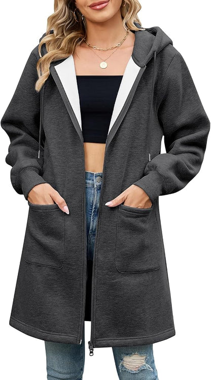 Women's long green cardigan styled with jeans for a casual look