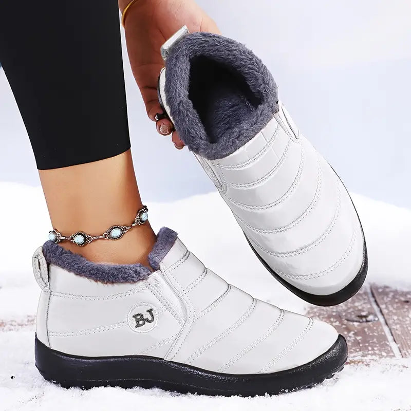 Purple fleece-lined waterproof boots for cold weather