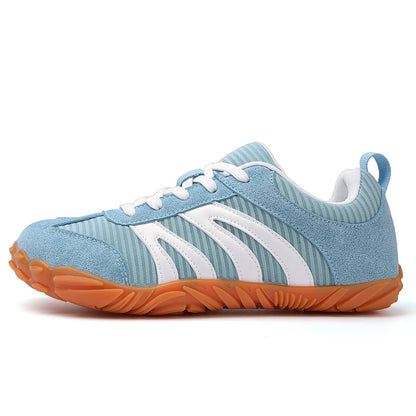 Side view of Harlow green unisex sneakers showing contrast side panels