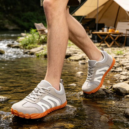 Harlow beige unisex sneakers worn on light pavement surface
