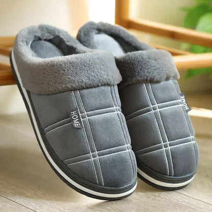 Huxley unisex slippers in black with cushioned insole visible