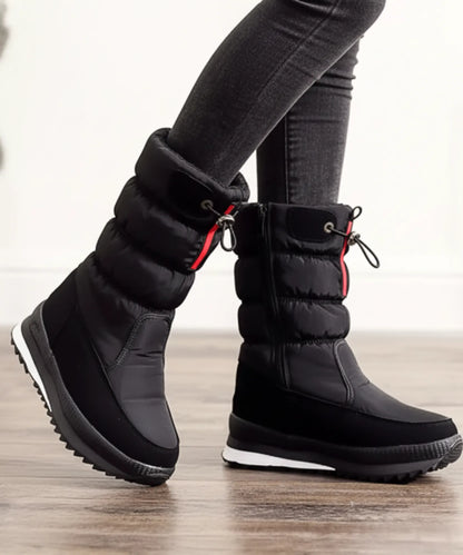 Lilica quilted snow boots white non-slip outsole on wet ground