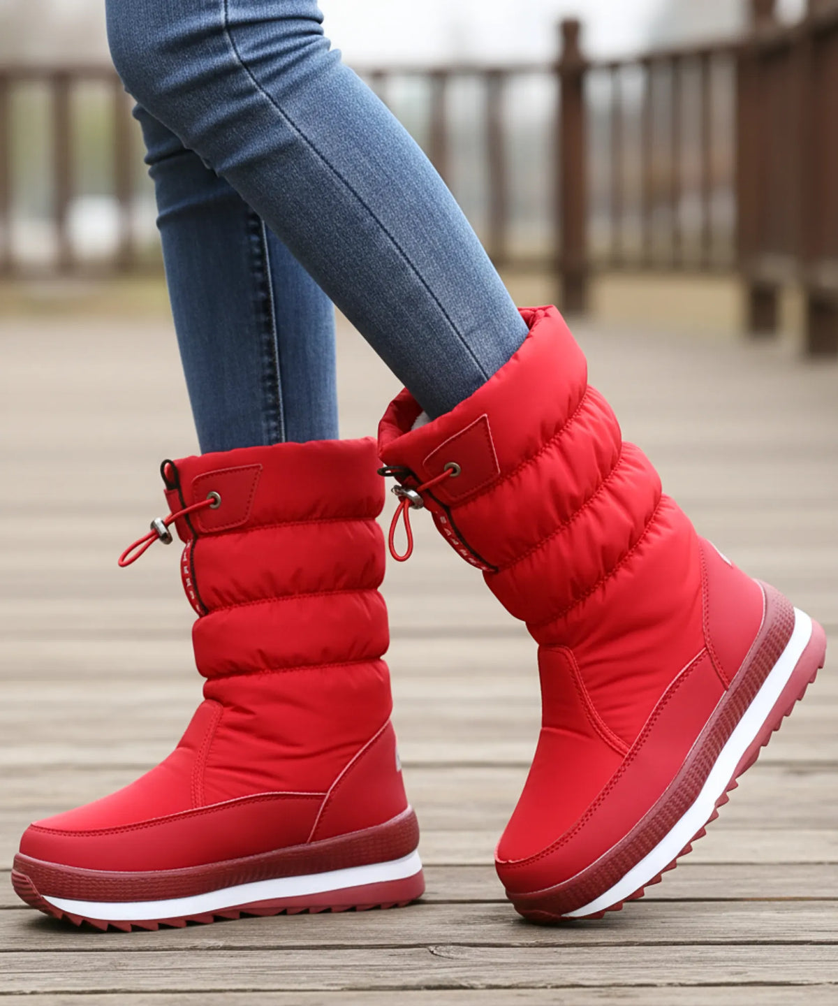 Women's waterproof puffer boots black hidden heel side view