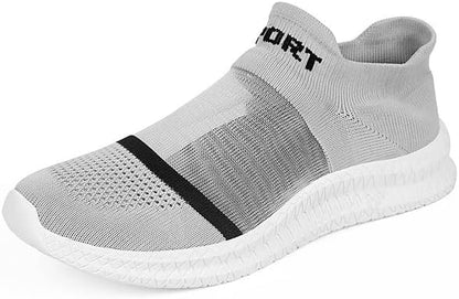 Men's casual slip-on sneakers in khaki styled with jeans