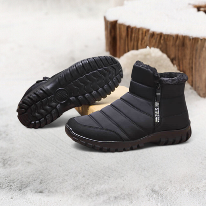 Colton orthopedic boots black shown on icy outdoor surface