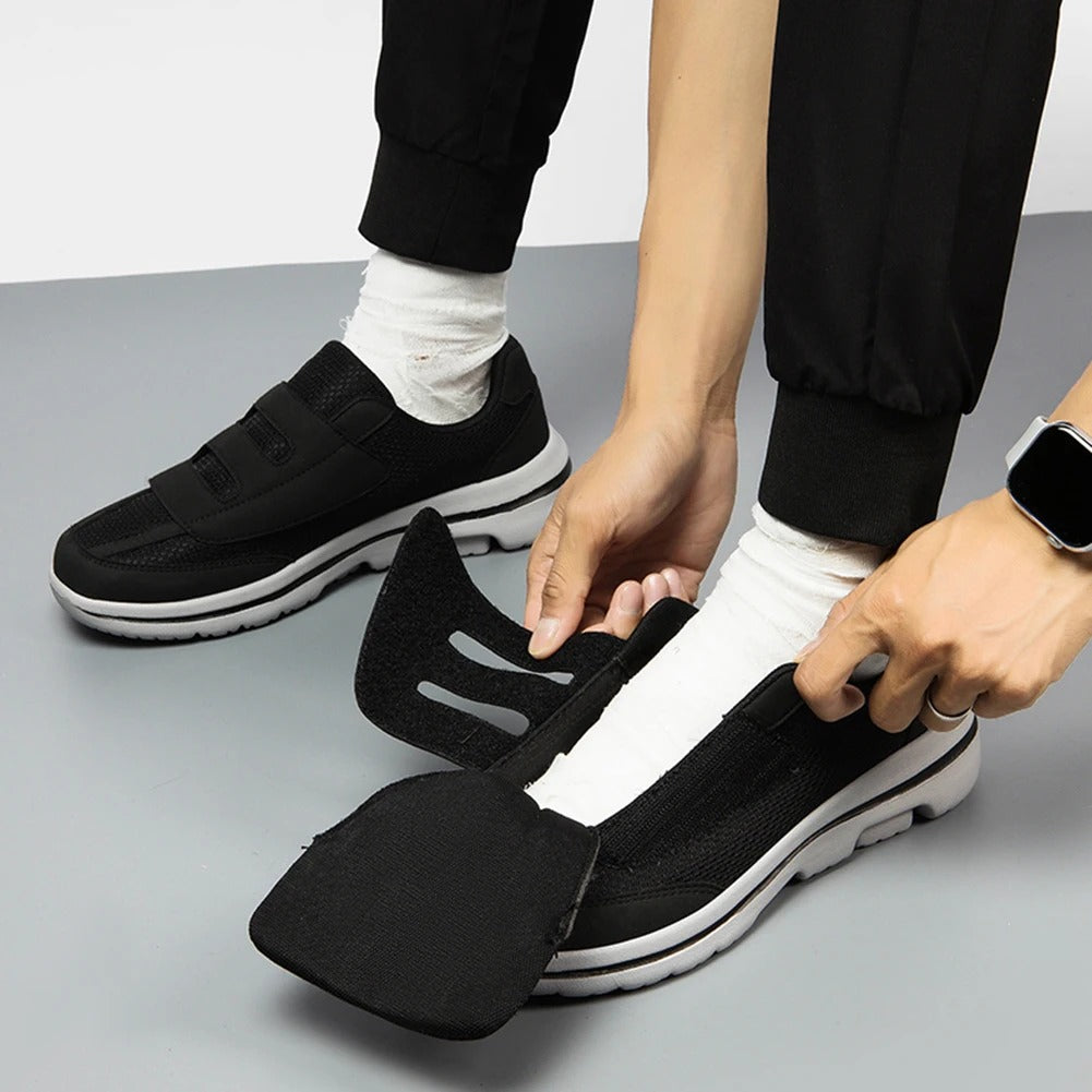 Side view of Striden gray wide fit shoes showing openable upper design