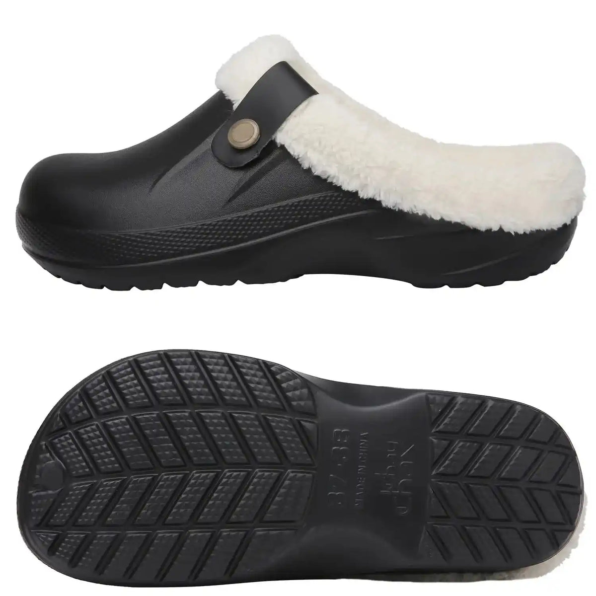 Norval slippers in black and white colourway on a neutral background