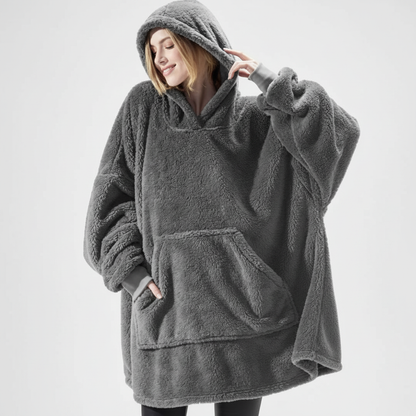 Olive green oversized fleece robe with roomy hood pulled up for warmth