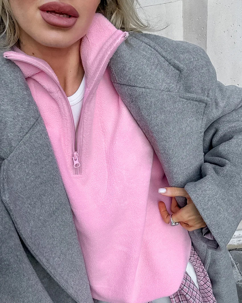 Close-up of half-zip fastening on Selvie women's fleece sweatshirt