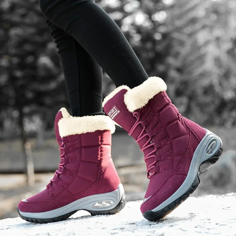 Sylvara women's boots in dusty mauve styled with a long coat