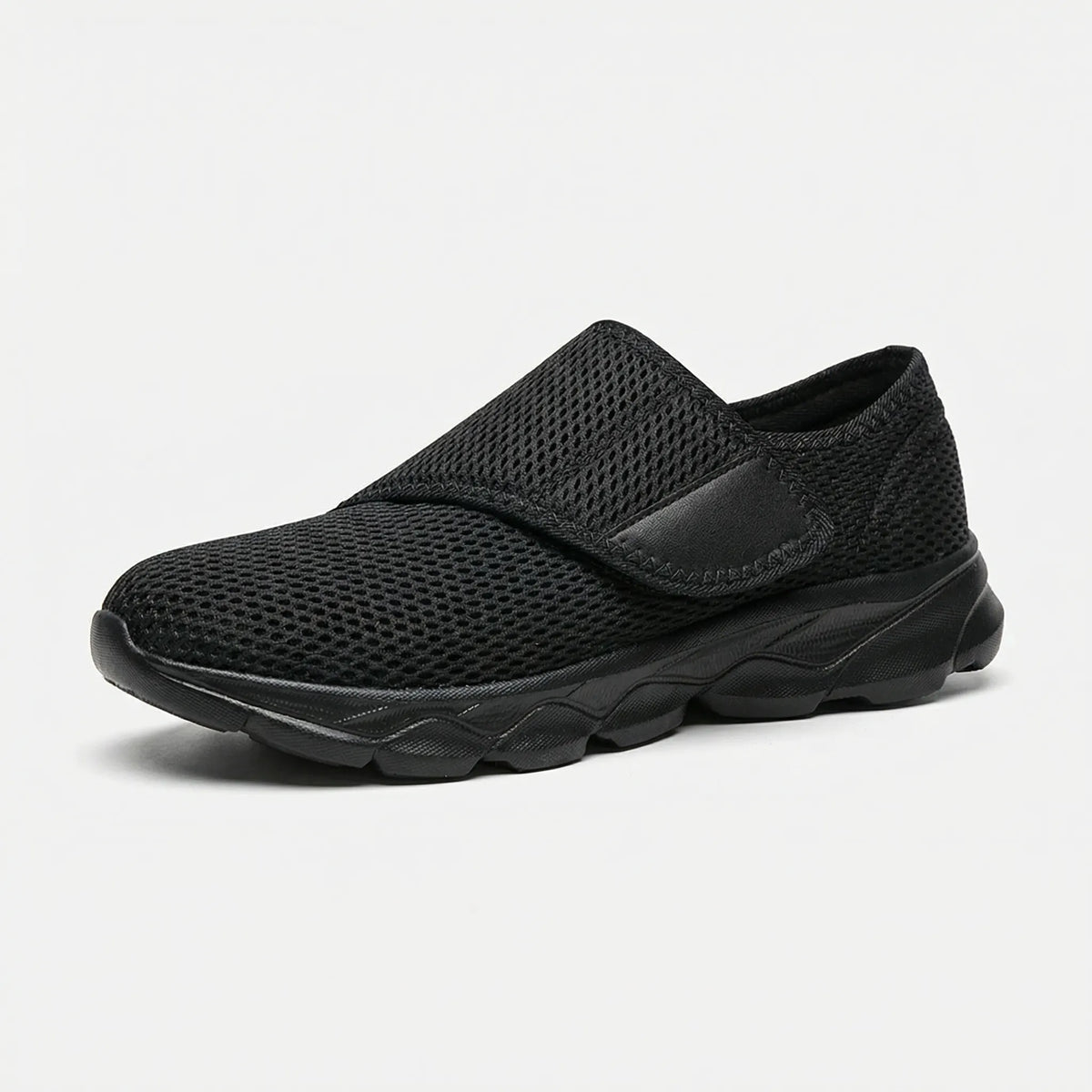 Wide-fit orthopedic shoe with roomy toe box, side view