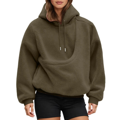 Close-up of kangaroo pouch pocket detail on women's fleece hoodie