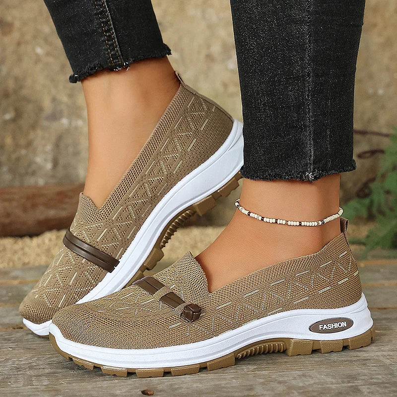 Black knit slip-on shoes for women with cushioned support