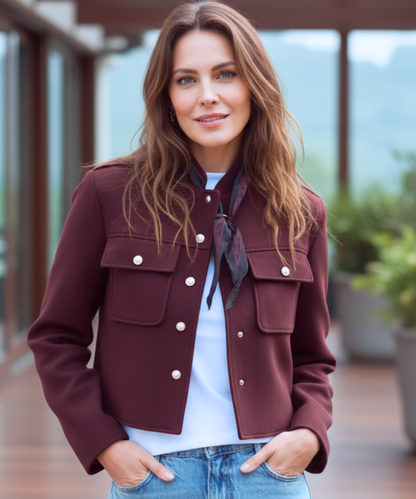 Full-length view of women's tailored wool jacket with gold button fastening