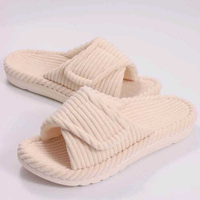 Close-up of multi-layer cushioning sole on women's plush slippers