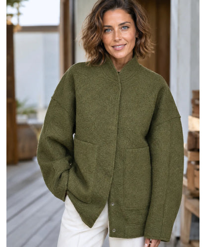 Structured collar detail on ivory bouclé wool bomber jacket
