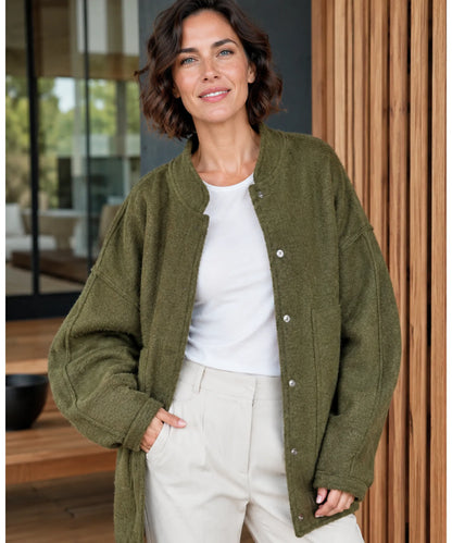 Bouclé bomber jacket in white styled for smart casual work look