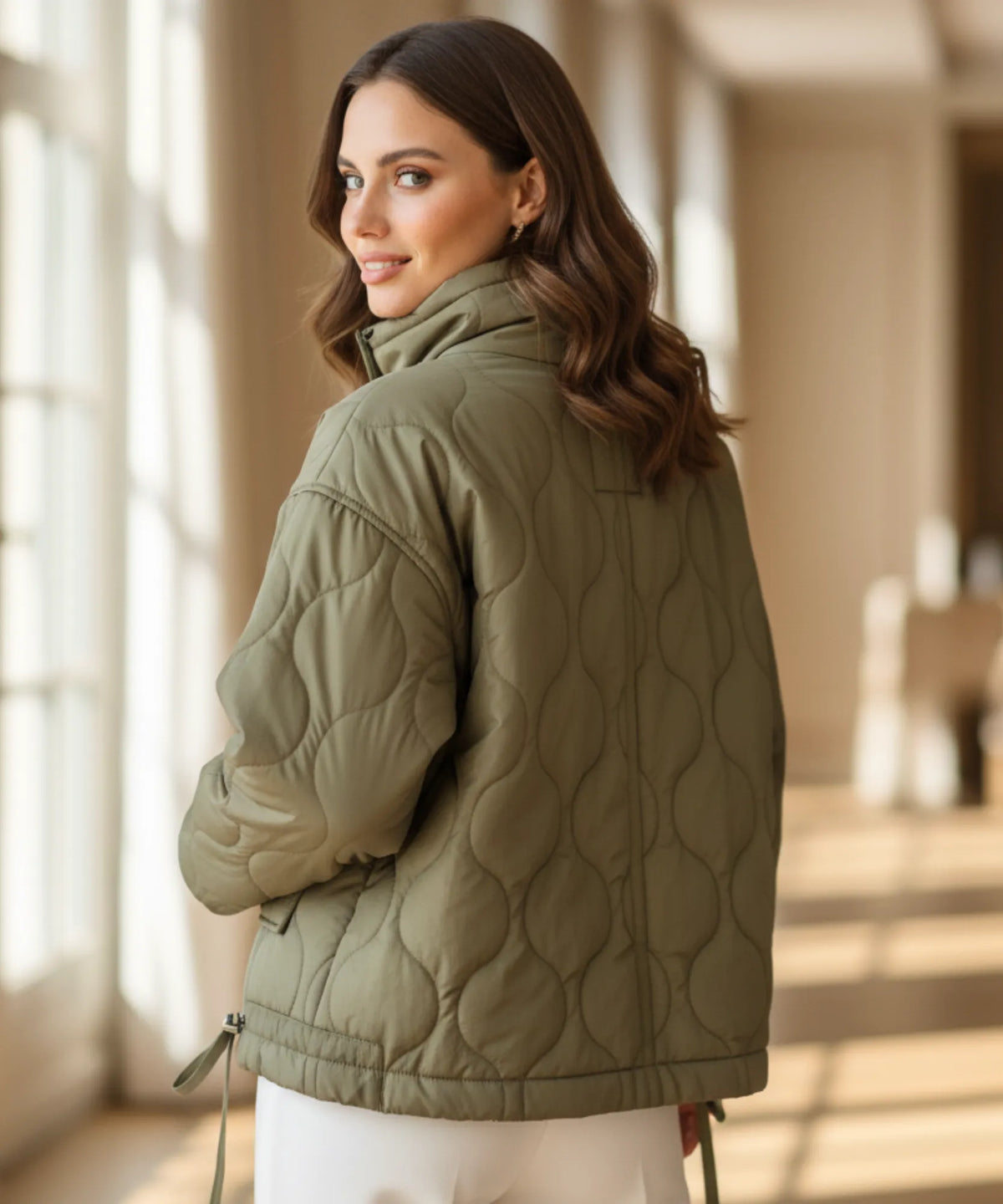 Quilted geometric stitching detail on women's oversized puffer jacket
