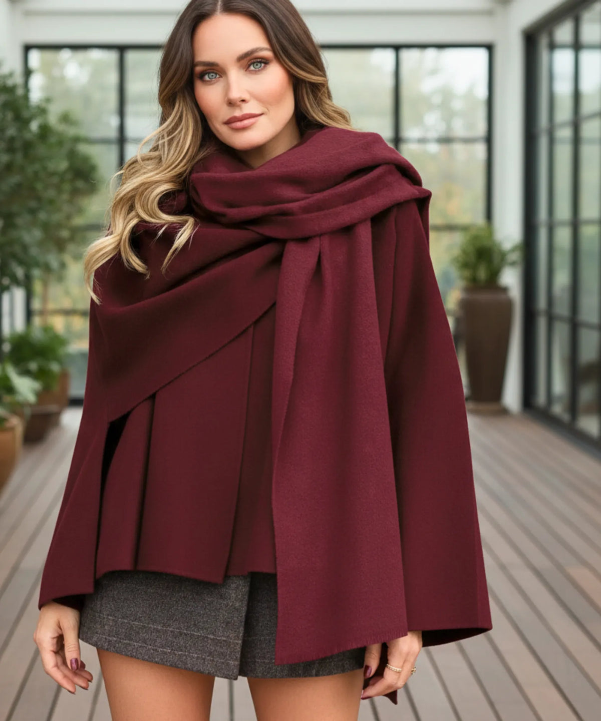 Women's wool wrap coat in charcoal showing oversized sleeves