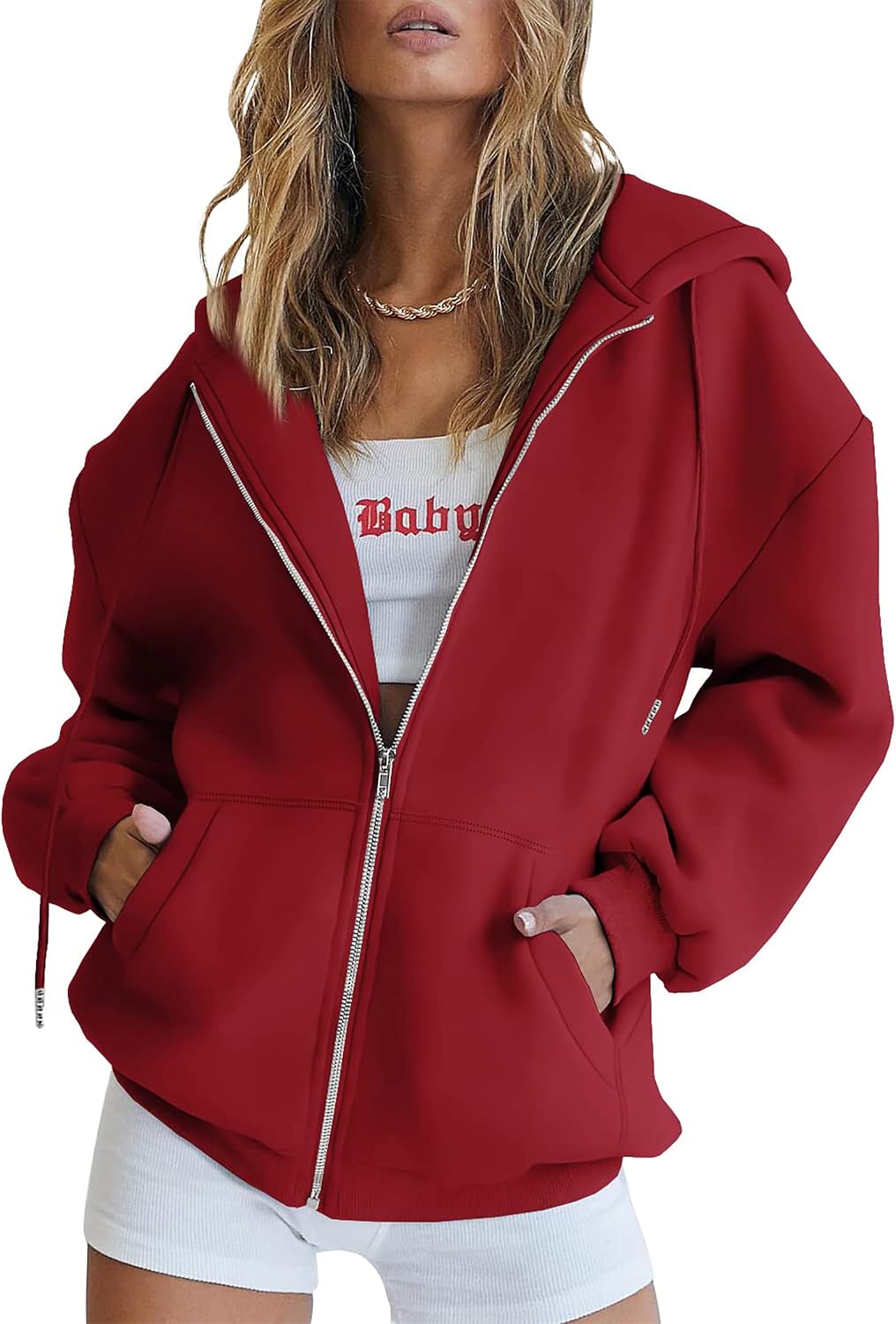 Women's oversized hoodie in beige flat lay showing full length and sleeve detail