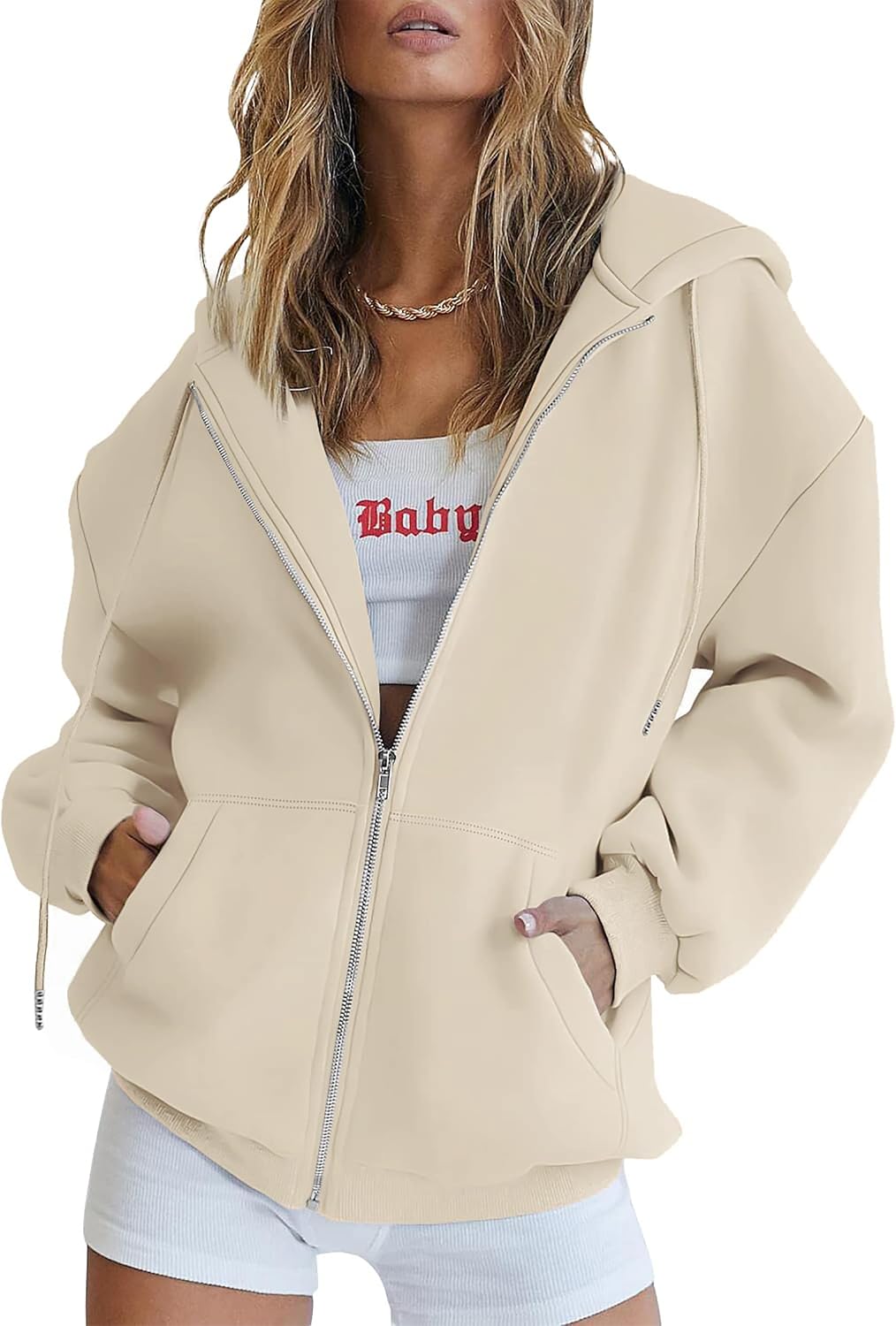 Size guide flat lay of women's oversized hoodie showing chest and length measurements