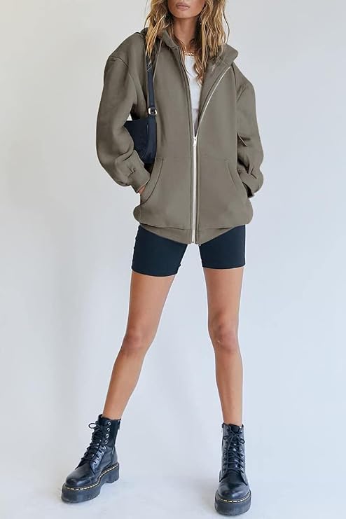 Front view of women's oversized hoodie with full-length zip and drawstring hood
