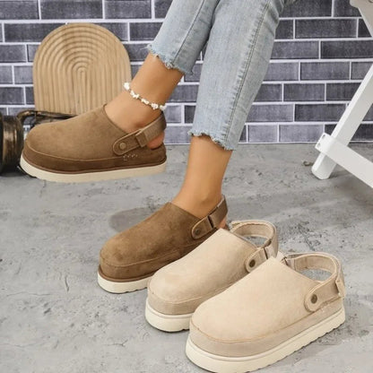 Side view of Celia women's platform clogs showing raised sole