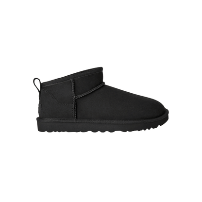 Chestnut women's mini boot worn outdoors on cobblestone