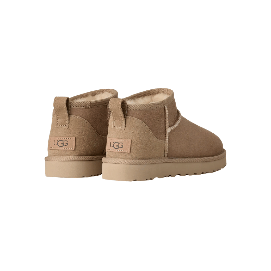 Close-up of double-face sheepskin upper on women's mini boot