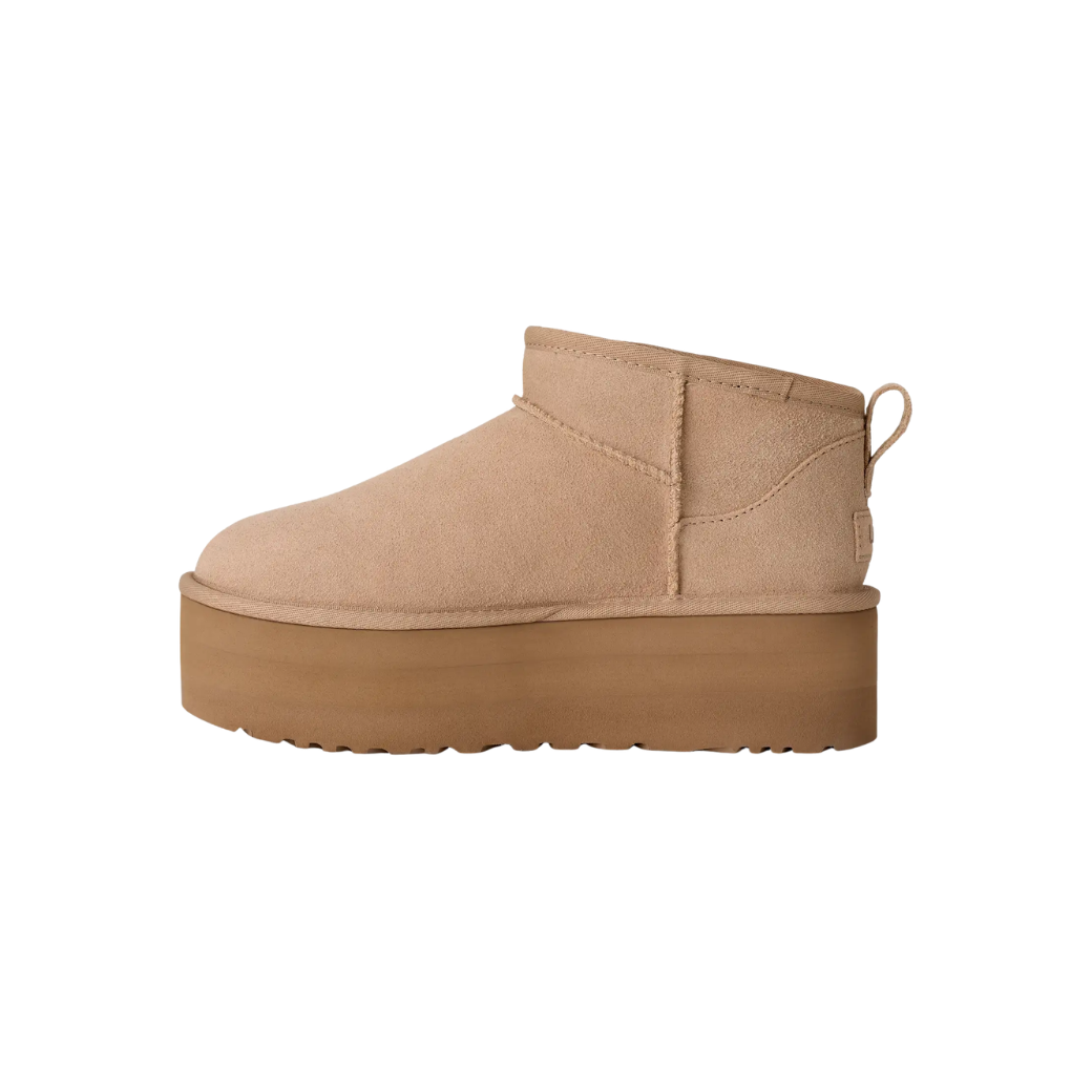 Low shaft design detail on women's platform sheepskin boots
