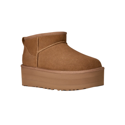 Avery platform sheepskin boots side profile view in sand