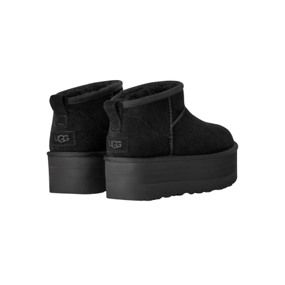 Avery boots in chestnut on wooden floor lifestyle setting