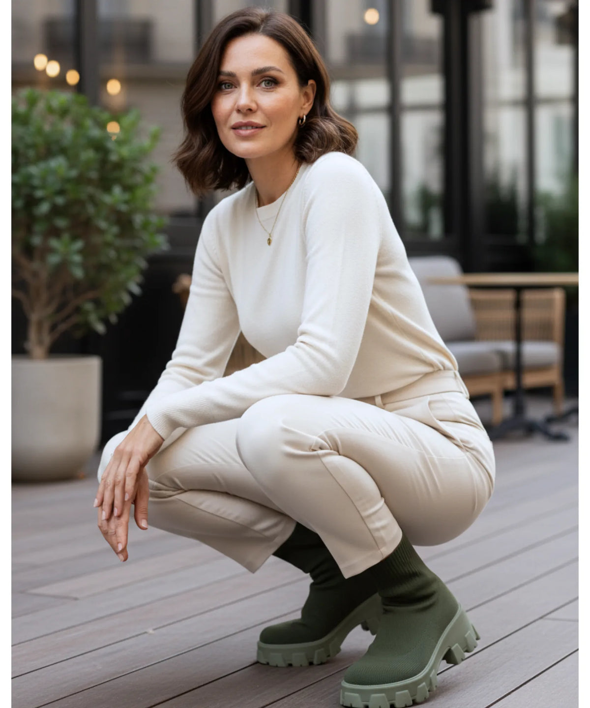 Nora sock boot in army green showing mid-calf fit and tonal finish