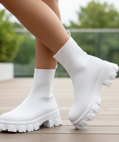 Women's ivory slip-on sock boot with rounded toe and structured front