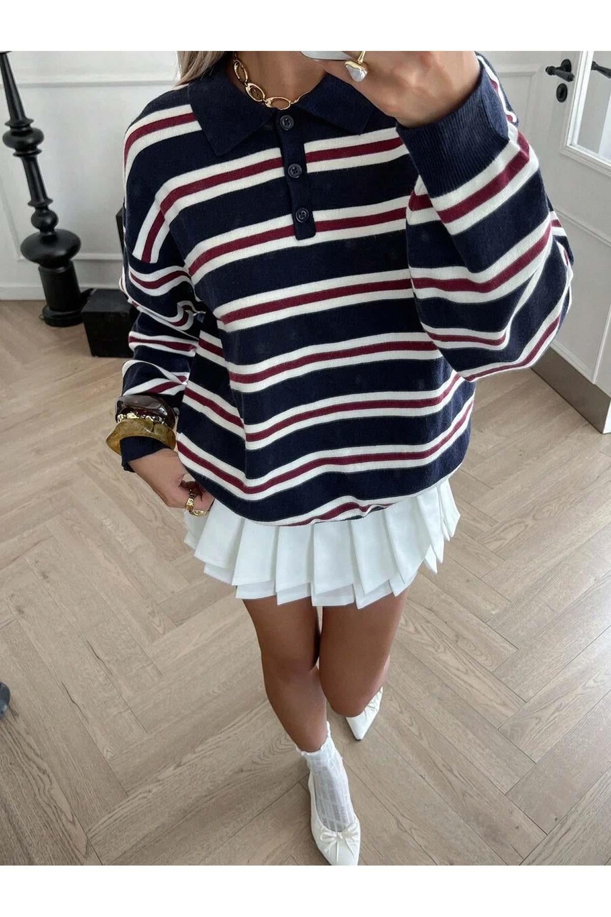 Women's navy blue knit sweater with stripe design and polo neckline