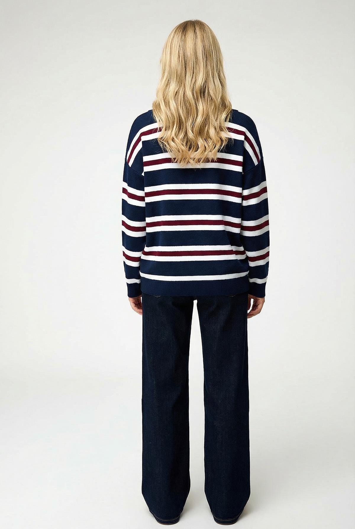 Front view of Lyra women's navy blue striped knit sweater