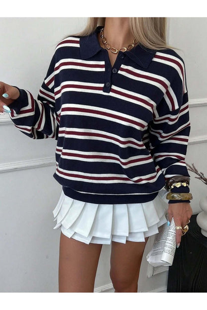 Back view of women's navy striped polo collar knit sweater