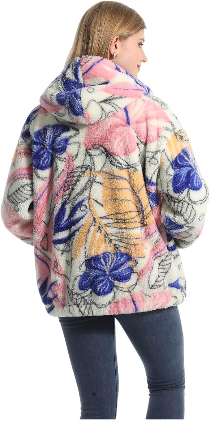 Close-up of soft teddy fleece texture and colourful floral print on women's jacket