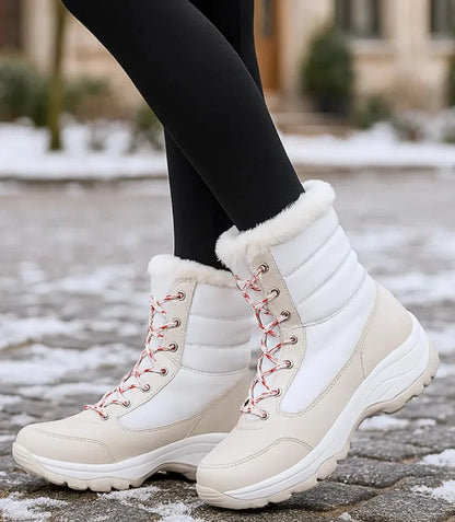 Freya women's waterproof snow boots in black with fur trim collar and lace-up front