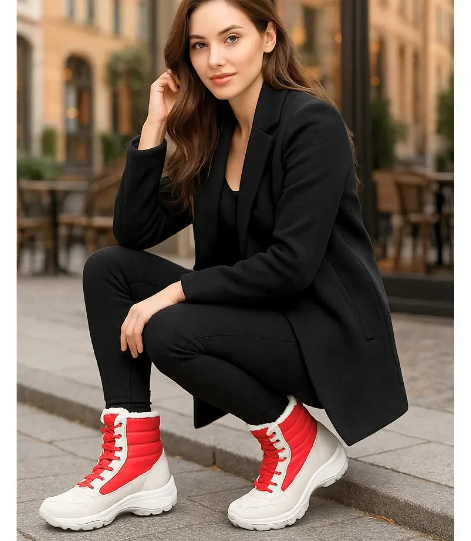 Women's waterproof snow boots showing vegan leather toe panel and quilted shaft