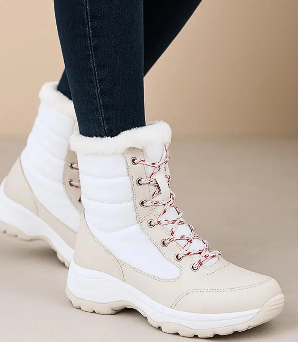 Close-up of fur trim collar on black waterproof winter boots for women
