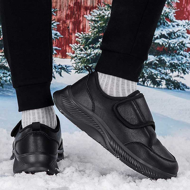 Top-down view of women's wide-fit velcro nursing sneakers in black